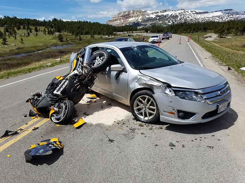 car and motocycle wreck towing